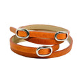 Triple Bracelet by TOKYObay. Soft orange leather double wrap bracelet with washed color pallet and oval buckle accents. Women's fashion accessories for the everyday.